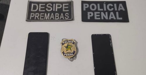Jovem é presa tentando entrar com celulares em presídio